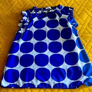 Blue and white polka dot sleeveless shirt